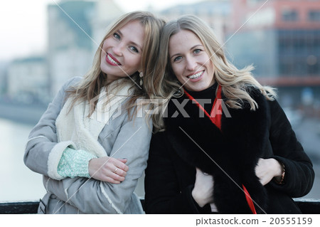 two women friends traveling city happiness 20555159