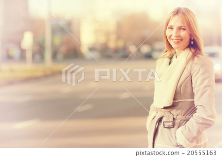 Spring warm blonde portrait in the city Spring warm blonde portrait in the city 20555163