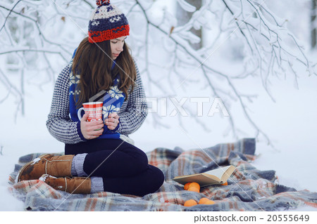 Girl adult tangerine winter snow, the concept of vitamins immunity Girl adult tangerine winter snow, the concept of vitamins immunity 20555649