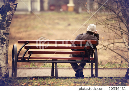 lonely man on the bench autumn, winter 20556481