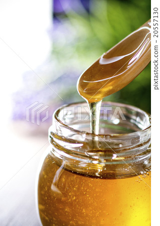Scooping honey 20557130