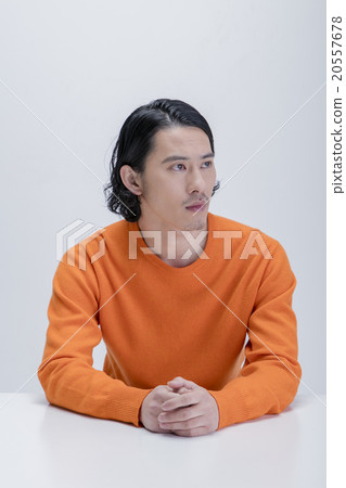 A man wearing a knit 20557678