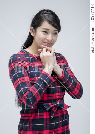 A woman in check one piece A woman in check one piece 20557718