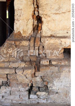 The old cracked wall of the abandoned ruins. 20560343