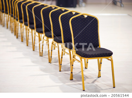 Row of chairs in a boardroom 20561544