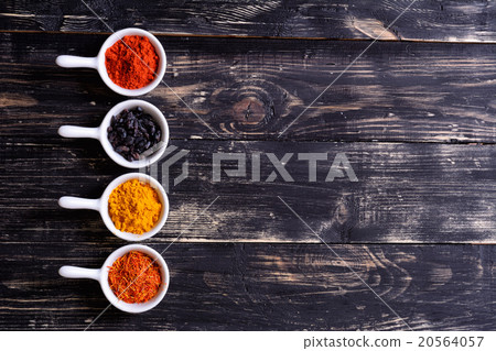 Spices in ceramic bowls 20564057