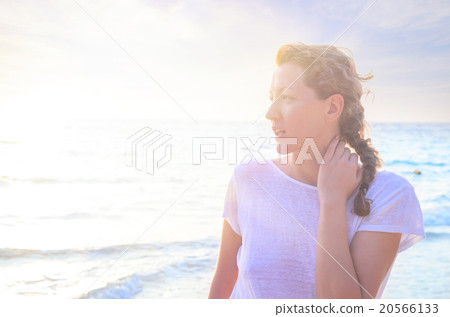 Portrait of young woman at the beach Portrait of young woman at the beach 20566133