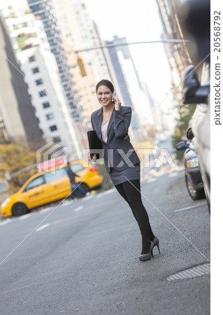 Woman Talking on Cell Phone in New York City 20568792