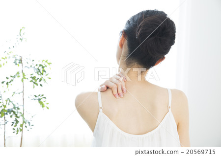 A woman with shoulder stiffness A woman with shoulder stiffness 20569715