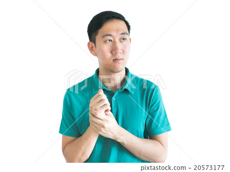 Serious Asian man thinking about something Serious Asian man thinking about something 20573177