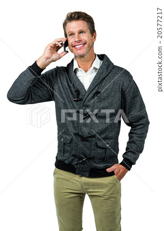 Happy handsome man talking on mobile phone Happy handsome man talking on mobile phone 20577217