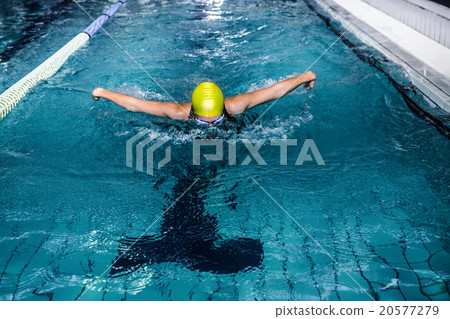 Swimmer woman swimming in the swimming pool Swimmer woman swimming in the swimming pool 20577279