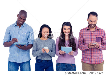 Multi-ethnic friends using technologies 20577324