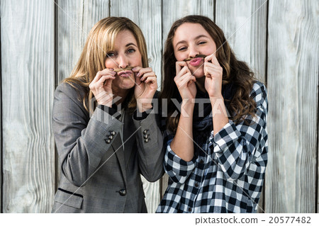Mother and daughter having fun Mother and daughter having fun 20577482