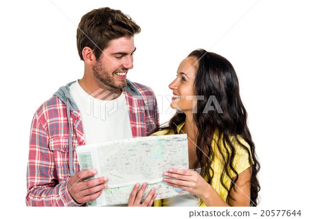 Smiling couple holding map Smiling couple holding map 20577644
