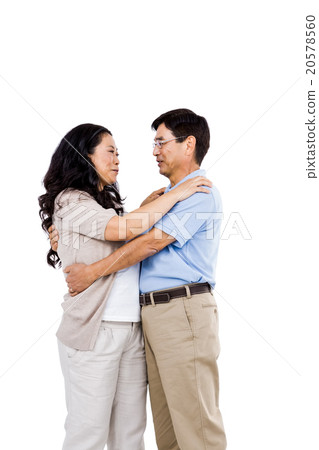 Smiling couple holding each other Smiling couple holding each other 20578560