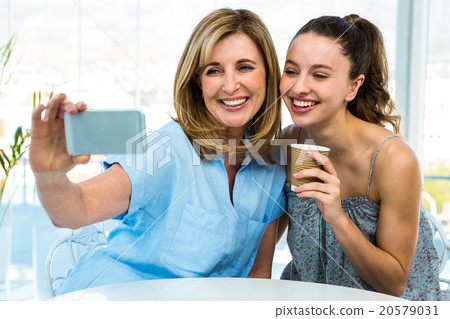 mother and daughter take selfie mother and daughter take selfie 20579031
