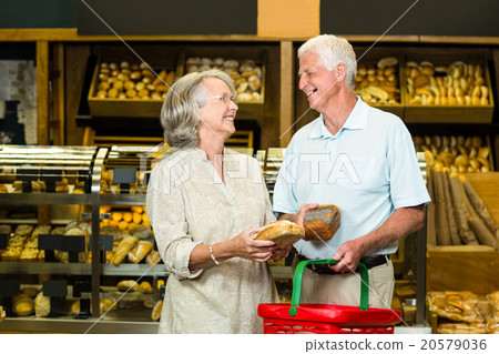 Senior couple buying bread Senior couple buying bread 20579036