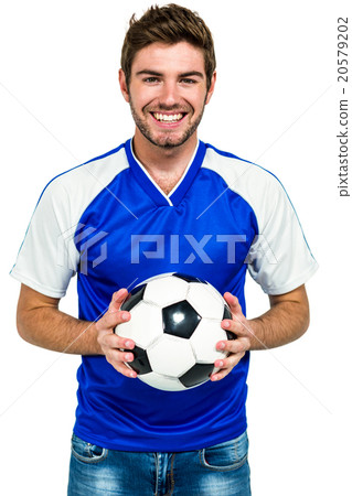 Portrait of happy man holding football Portrait of happy man holding football 20579202