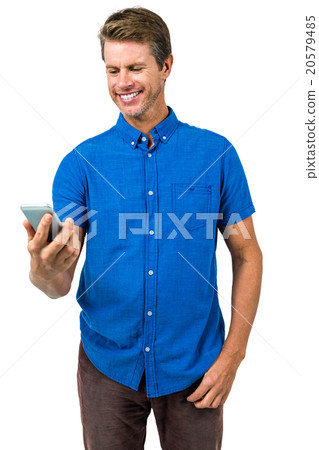 Cheerful man using mobile phone Cheerful man using mobile phone 20579485