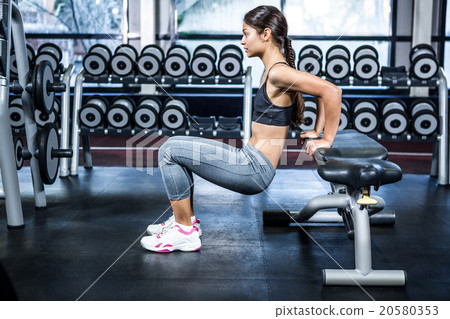 Fit woman doing fitness exercises Fit woman doing fitness exercises 20580353