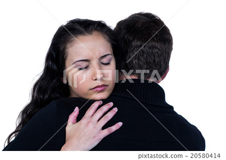 Close-up of couple hugging 20580414
