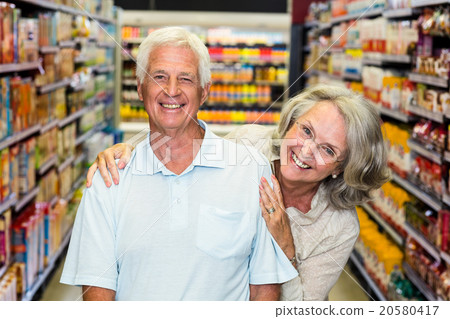 Happy senior couple at the supermarket 20580417
