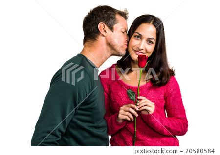 Man kissing girlfriend Man kissing girlfriend 20580584