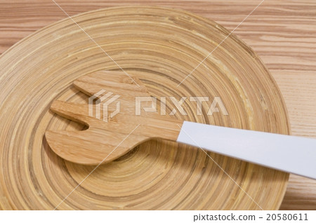 Wooden Fork Cutlery on A Wooden Dish 20580611