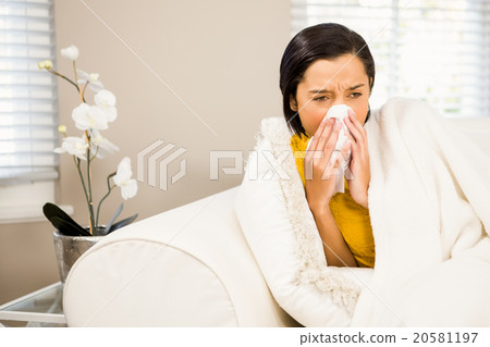 Attractive brunette sneezing Attractive brunette sneezing 20581197