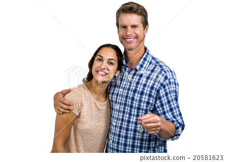 Portrait of cheerful couple with keys Portrait of cheerful couple with keys 20581623