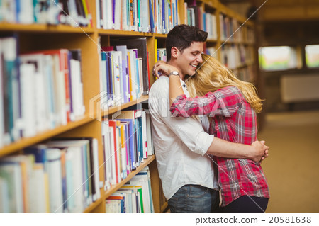 Student couple embracing each other 20581638