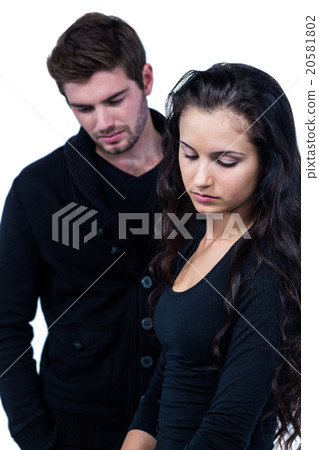 A Sad couple near each other 20581802