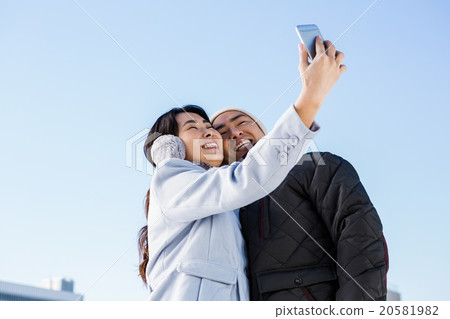 Cute couple taking selfie 20581982
