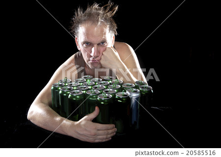 Hangover.The drunk man and is a lot of empty beer  20585516