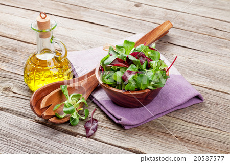 Corn salad leaves and olive oil 20587577
