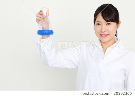 Researchers with flasks 20592360