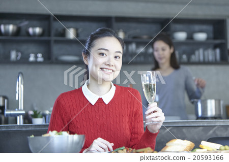 A woman enjoying a meal 20593166
