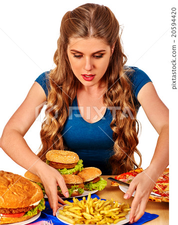 Girl eating big sandwich. Girl eating big sandwich. 20594420