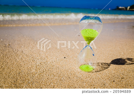 Sandy beach and hourglass 20594889
