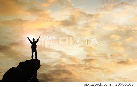 Silhouette of the person on the peak of mountain Silhouette of the person on the peak of mountain 20596165