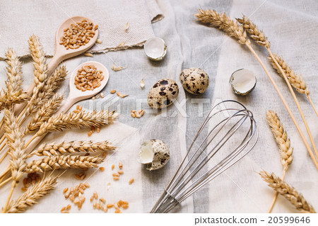 Baking background with eggs and wheat grain Baking background with eggs and wheat grain 20599646
