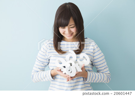 A young lady choosing a number A young lady choosing a number 20601447