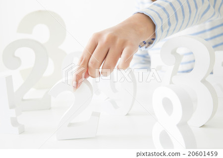 A young lady choosing a number A young lady choosing a number 20601459