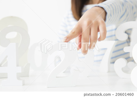 A young lady choosing a number A young lady choosing a number 20601460