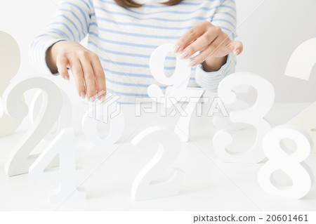 A young lady choosing a number A young lady choosing a number 20601461