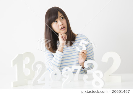 A young lady choosing a number A young lady choosing a number 20601467