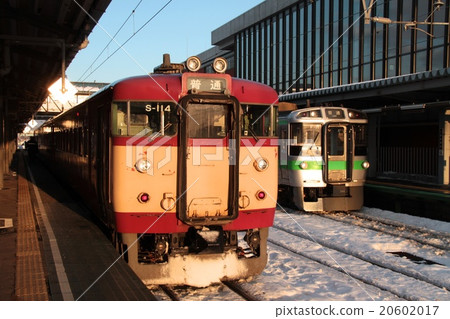 At Iwamizawa station, 711 series train S-114 organization in sunset 20602017