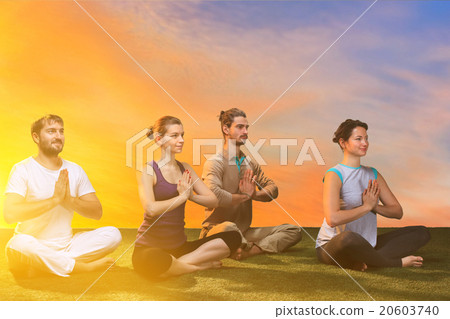 The group of people doing yoga exercises The group of people doing yoga exercises 20603740