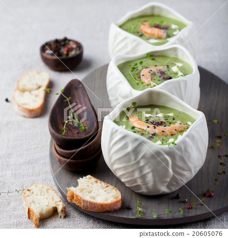 Broccoli, spinach cream soup, shrimp, wooden board Broccoli, spinach cream soup, shrimp, wooden board 20605076